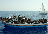 Looking for a new start: A leaking boat crowded with more than 300 asylum seekers before its interception.